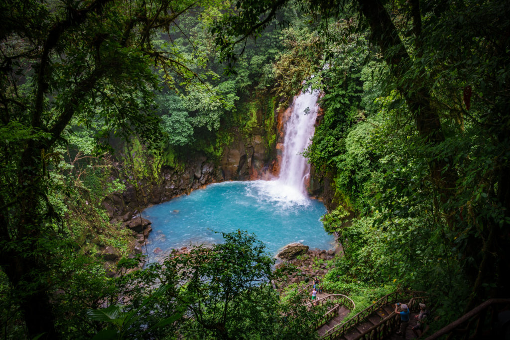 Celestial blue waterfall in volcan tenorio national park costa rica